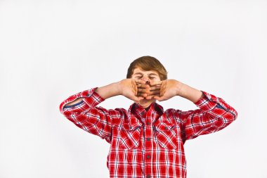 Friendly looking young boy with red shirt