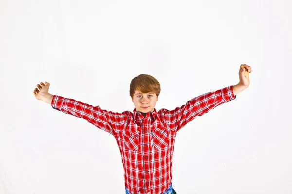 Friendly looking young boy with red shirt — Stockfoto