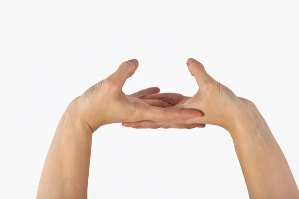Женская рука показана в жесте йоги — стоковое фото