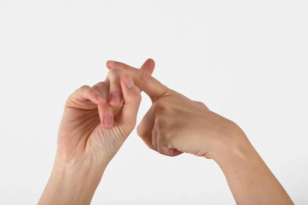 Een dames hand wordt weergegeven in yoga gebaar — Stockfoto