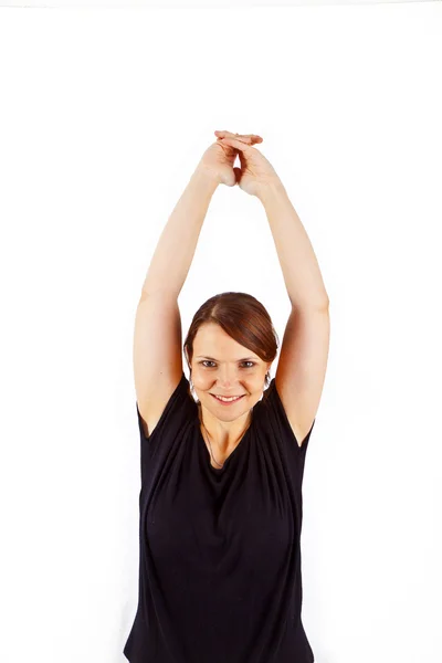Atractiva mujer entrena yoga — Foto de Stock