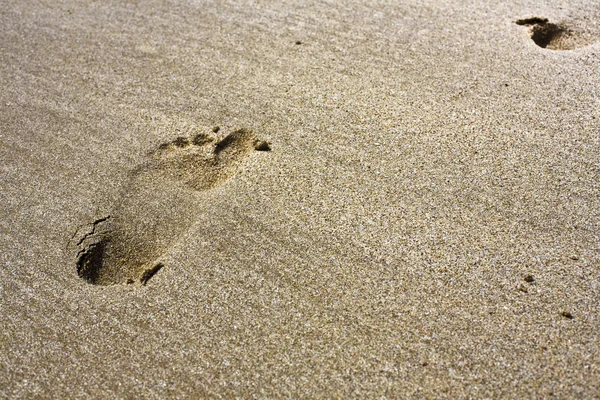 Marca de pies en la playa —  Fotos de Stock