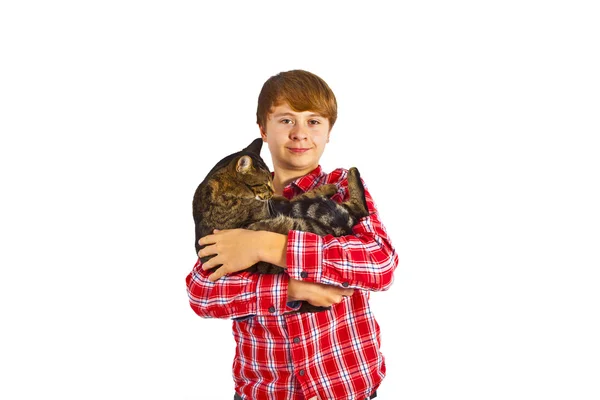 Ładny chłopak przytulanie z jego kot — Zdjęcie stockowe
