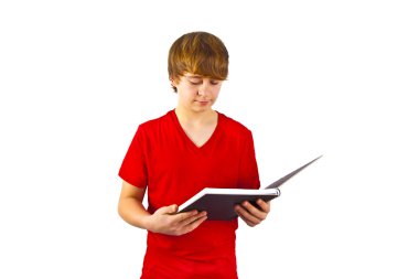 Smart boy reading in a book clipart