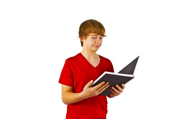 Κομψός αγόρι ανάγνωση σε ένα βιβλίο — Φωτογραφία Αρχείου