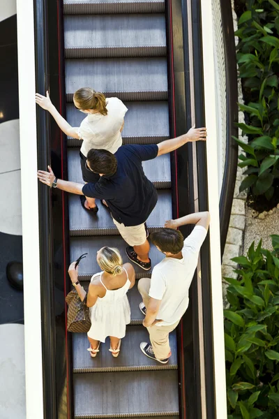 stock image on a moving staircase in modern shopping center in Frankfurt