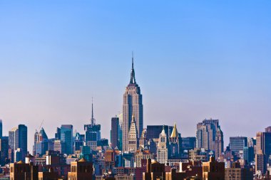 View of midtown Manhattan with landmark buildings in New York clipart