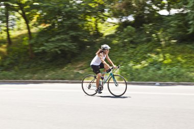 Biker in central Park clipart