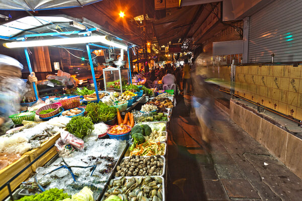Fresh fish and vegetables offered at the night market