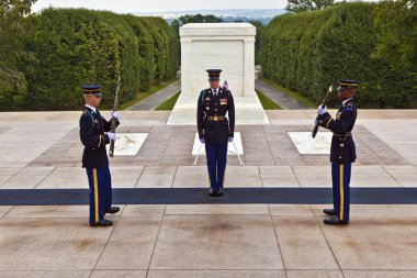 Changing the guard at Arlington national Cemetery in Washington clipart