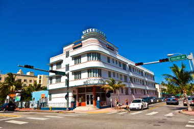 Midday view at Ocean drive with art deco buildings clipart