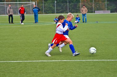 Children of BSC SChwalbach playing soccer clipart