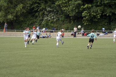 Children of BSC SChwalbach playing soccer clipart