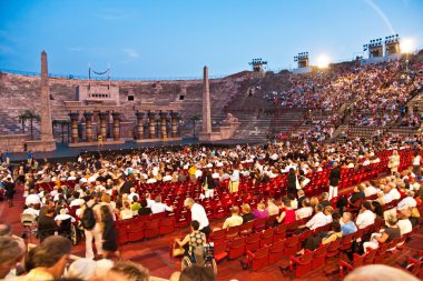 are waiting for the start of the opera in the arena of ve clipart