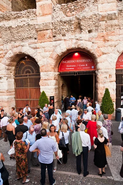 stock image Visitors, spectators are waiting outside the arena di verona for