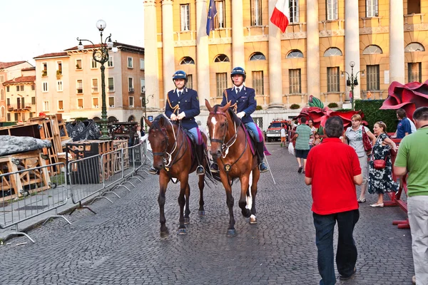 Stock image Police on horses are watching and helping the spectators enterin