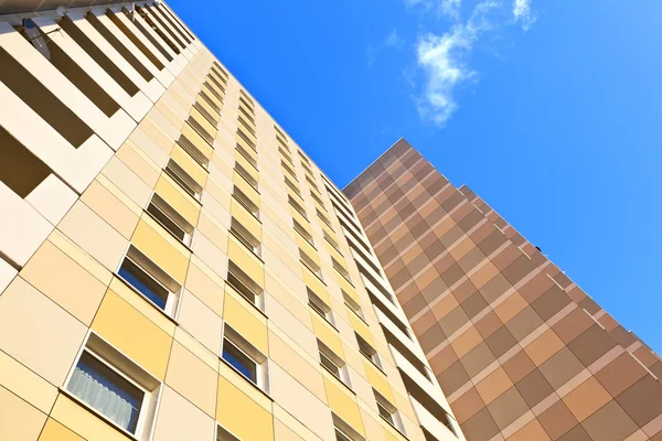 stock image Facade of skyscraper with apartments with blue sky