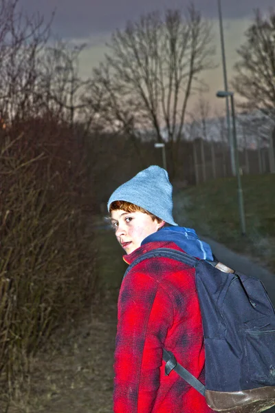 Portrait of young teenage boy in the night — Stock Photo, Image