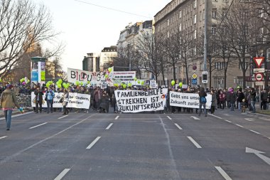 demonstrating against cutting of social spenditures clipart