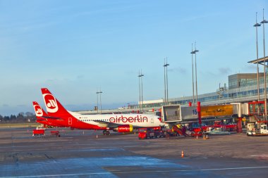 Aircraft at the finger in the modern Terminal 2 clipart