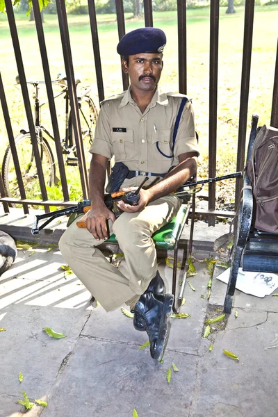 stock image Policeman pays attention in the Red Fort to protects visitors