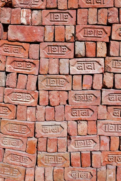 stock image Red stapled bricks give a harmonic pattern in the sun