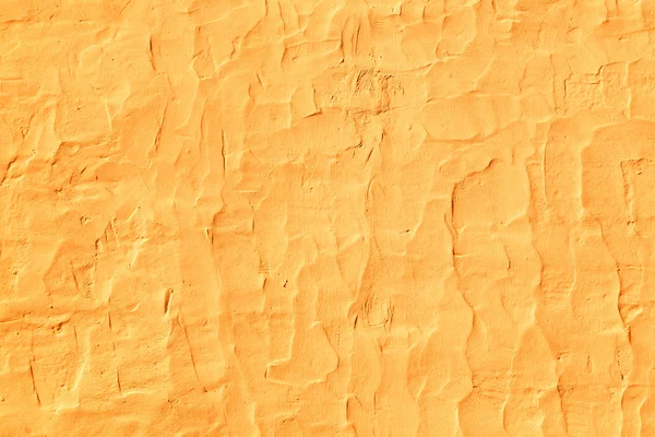 Grunge textuur van Oranje cement muur — Stockfoto
