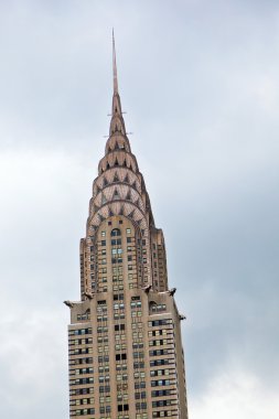 Top of the Crysler Building in the afternoon clipart