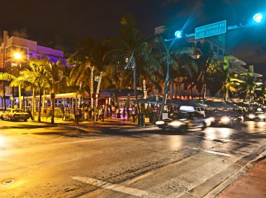 Night view at Ocean drive on in Miami Beach in the art deco dist clipart