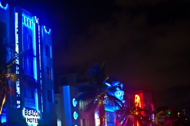 Night view at Ocean drive on in Miami Beach in the art deco dist clipart