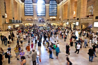 View of commuters and tourists flood the grand central station clipart