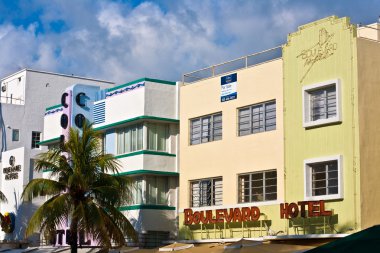 Midday view at Ocean drive in Miami Beach with Art Deco architec clipart