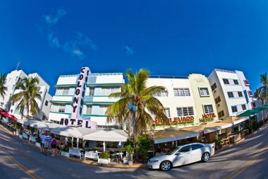 Midday view at Ocean drive in Miami Beach with Art Deco architec clipart