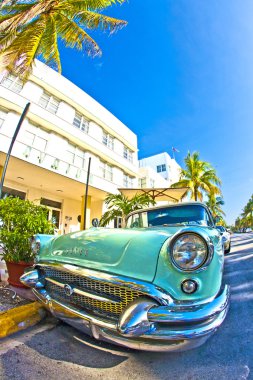 The old Buick from 1954 stands as attraction in front of famous clipart