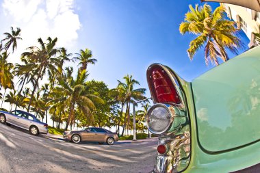 Old Buick from 1954 stands as attraction in front of famous Aval clipart