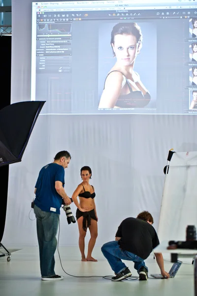 Shooting with models for visitors at photokina exhibition — Stock Photo, Image