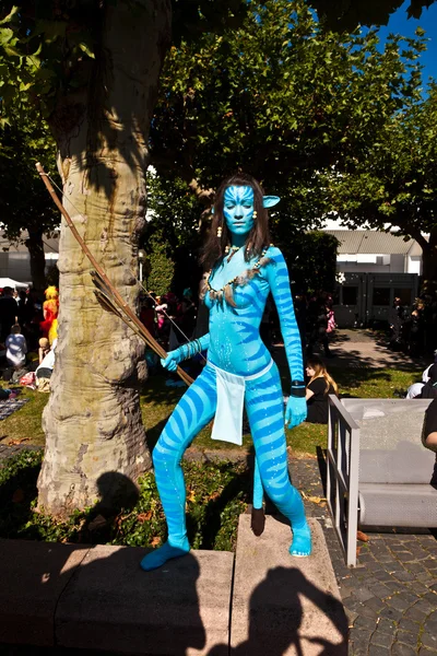 Menina colorida composta como figura Avatar na feira de livros em Frankfurt — Fotografia de Stock