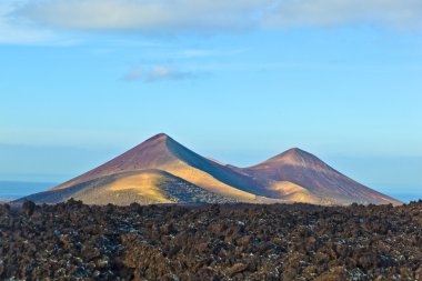 Volcano in timanfaya national park in Lanzarote, Spain clipart