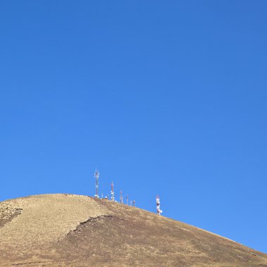 Radio telecommunications tower on top of an old volcano in Lanza