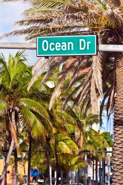 Midday view at Ocean drive in Miami Beach with Art Deco architec clipart