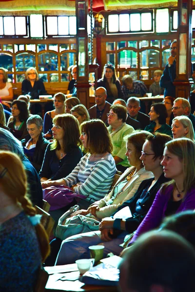 stock image Spectators are listening the authors in the reading tent