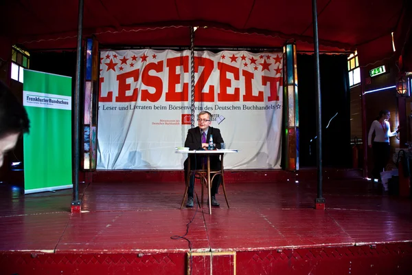 stock image Spectators are listening the authors in the reading tent