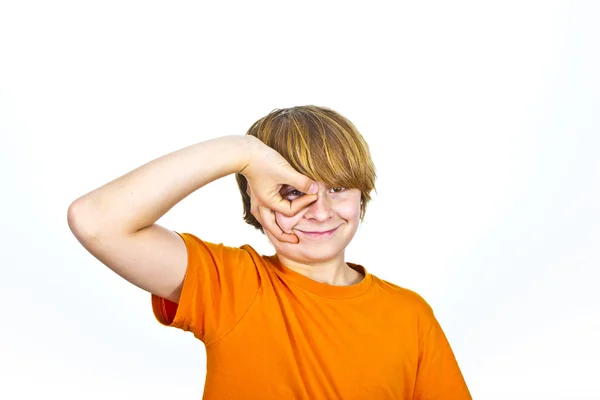 Happy smiling boy in orange shirt — Stock Photo, Image
