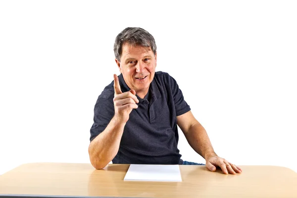 Casual business man sitting at a table — Stock Photo, Image