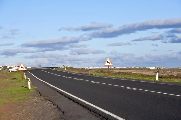 Stock image Street through rural area in Timanfaya national park, Lanzarote,