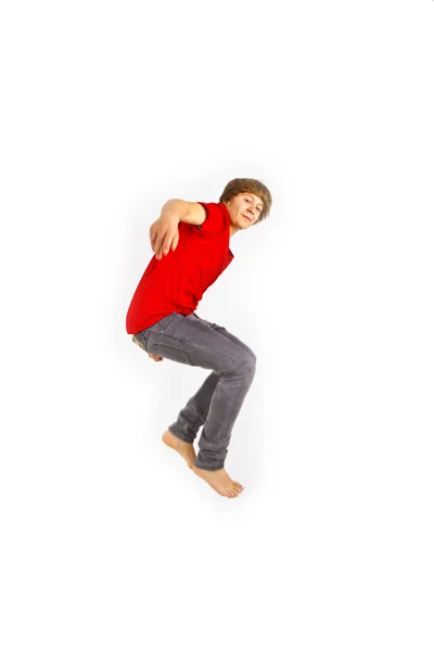 Retrato de adolescente saltando en el aire — Foto de Stock