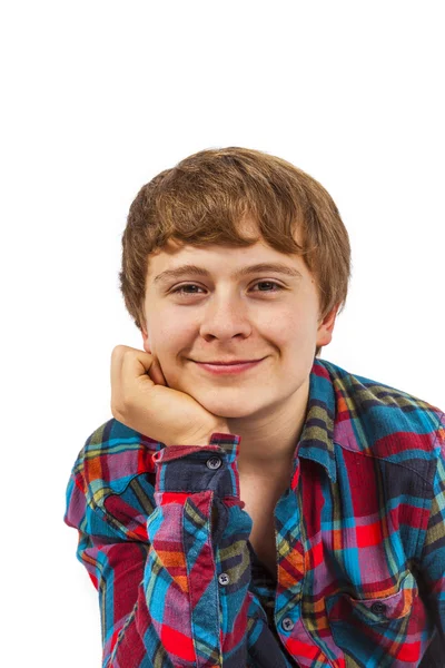 Happy boy in studio looking confident and smart with head on his — Stock Photo, Image