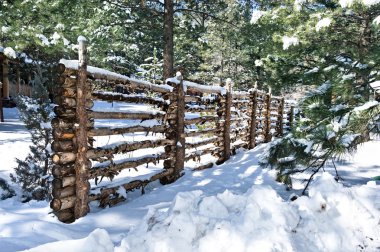 Log Fence Covered in snow clipart
