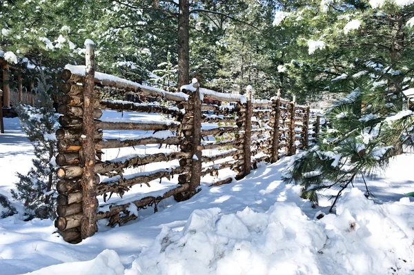 Log Fence Covered in snow — Stock Photo, Image