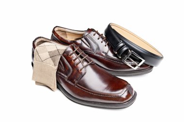 Brown leather shoes with socks and belt clipart